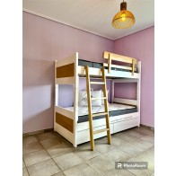 Κρεβάτι παιδικό-διπλή κουκέτα μασίφ ξύλο με χρώματα ουδέτερα και συρτάρια